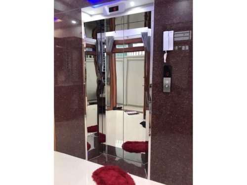 Cửa tầng inox bóng gương - khung bao rộng